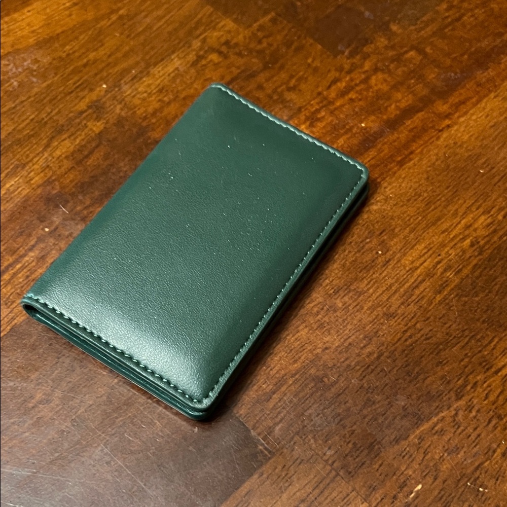 Oliver Company vegan compact wallet. Never used